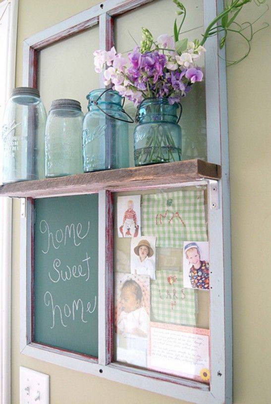 homemade chalkboard and bulletin board hanging with jars and purple accented items