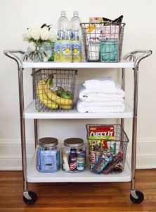 cute cart holding household goods towels food and essentials