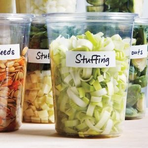 chopped and prepped thanksgiving food ready in containers and labeled