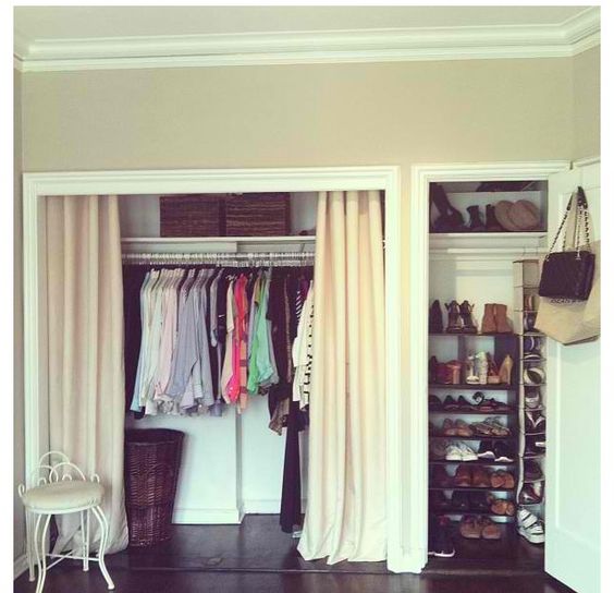 room displaying open curtain closet