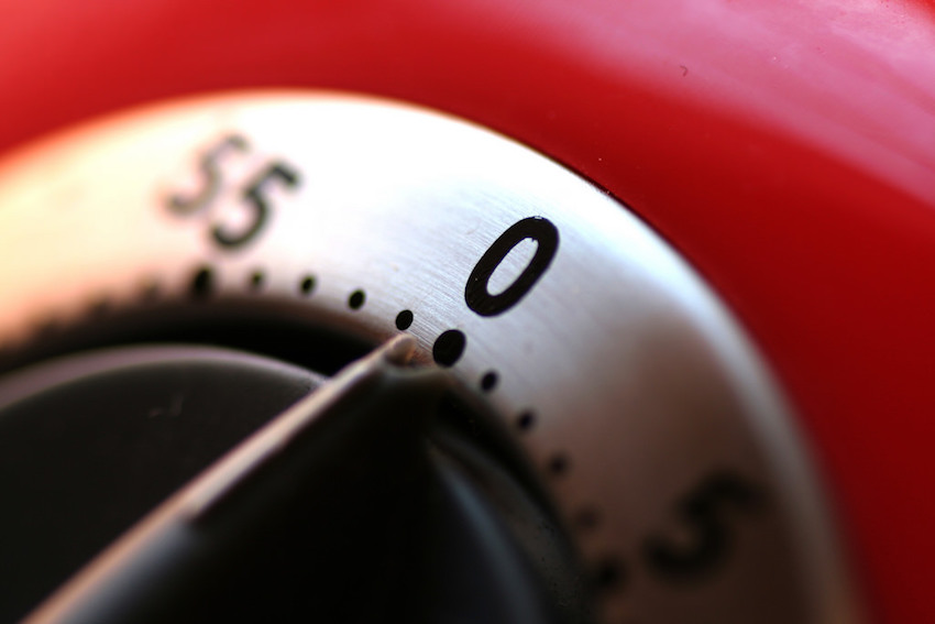 close-up of red cooking timer