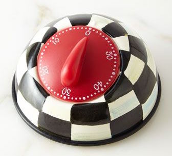 black and white checkered kitchen timer with red dial