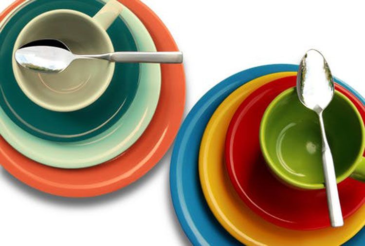Colorful plates and spoon