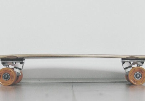 minimal sideways photo of an old school skateboard