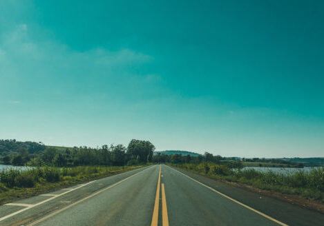 open road blue sky horizon line
