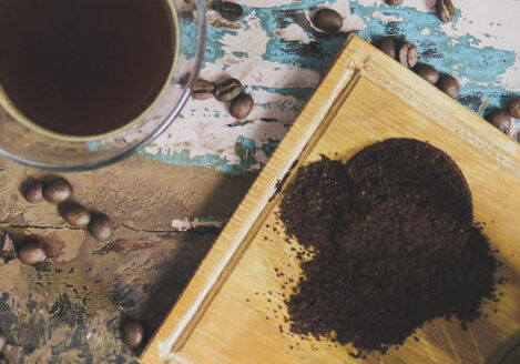 aerial view of countertop with coffee and coffee grounds